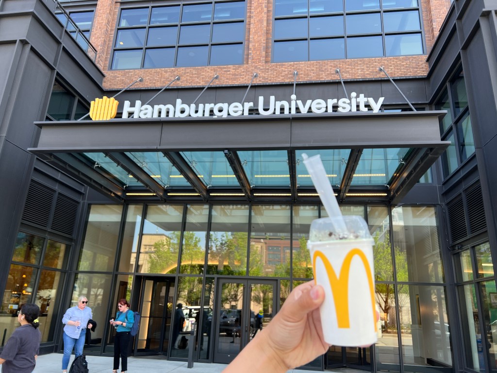 Matcha Oreo McFlurry with the Hamburger University sign